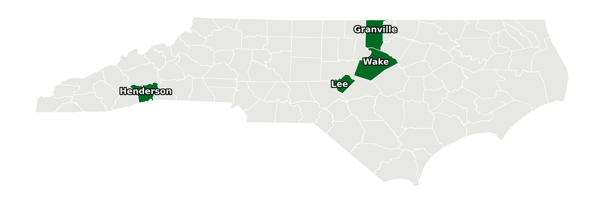Map of North Carolina with the four counties covered in this report shaded: Granville, Henderson, Lee, and Wake.