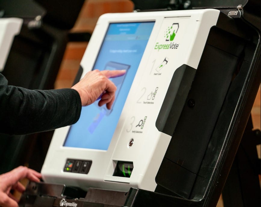 A voter casting a ballot on an ExpressVote machine in Monmouth County